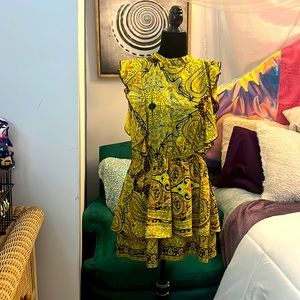 * Tag-less open back romper super cute.